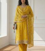 Yellow shimmer organza embroidered party wear suit