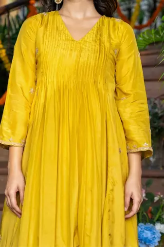 Yellow silk anarkali emboridered suit set