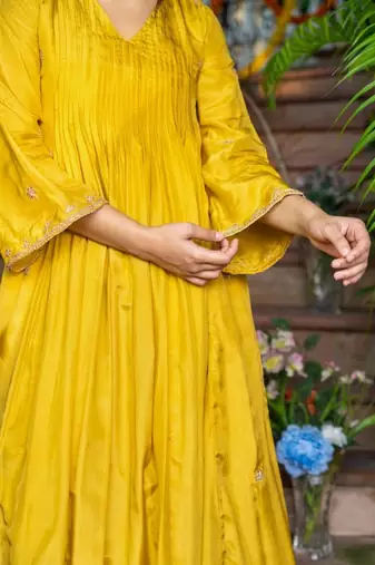 Yellow silk anarkali emboridered suit set