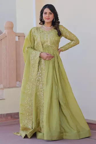 Tantalizing Pista Green Organza Mehendi Wear Gown With Dupatta
