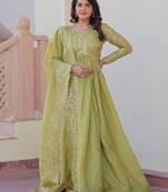 Tantalizing Pista Green Organza Mehendi Wear Gown With Dupatta