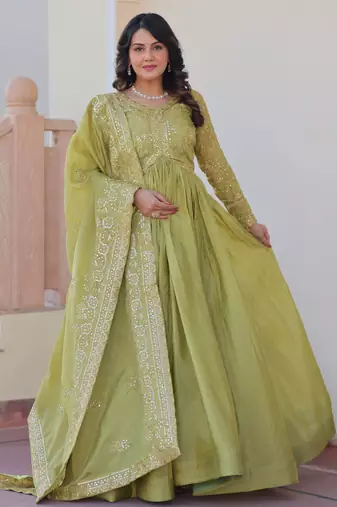 Tantalizing Pista Green Organza Mehendi Wear Gown With Dupatta