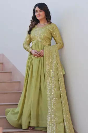Tantalizing Pista Green Organza Mehendi Wear Gown With Dupatta
