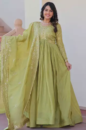 Tantalizing Pista Green Organza Mehendi Wear Gown With Dupatta