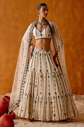 OFF WHITE SEQUINED EMBROIDERED WORK GEORGETTE LEHENGA  SET WITH CHOLI WITH DUPATTA.