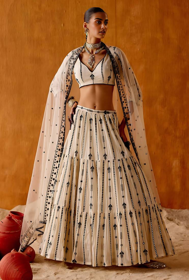 OFF WHITE SEQUINED EMBROIDERED WORK GEORGETTE LEHENGA  SET WITH CHOLI WITH DUPATTA.
