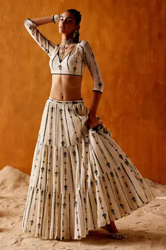 OFF WHITE SEQUINED EMBROIDERED WORK GEORGETTE LEHENGA  SET WITH CHOLI WITH DUPATTA.