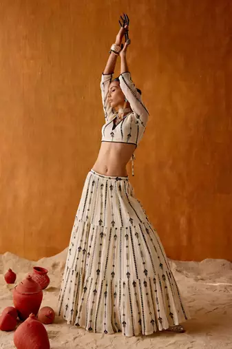 OFF WHITE SEQUINED EMBROIDERED WORK GEORGETTE LEHENGA  SET WITH CHOLI WITH DUPATTA.