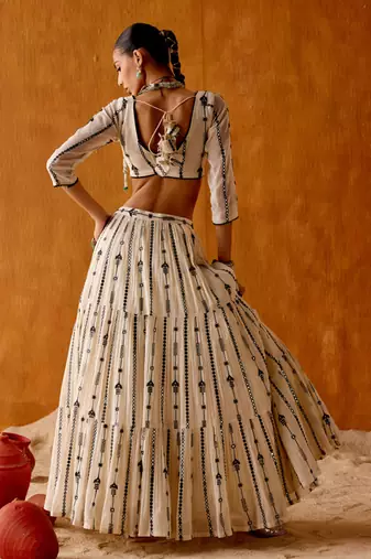 OFF WHITE SEQUINED EMBROIDERED WORK GEORGETTE LEHENGA  SET WITH CHOLI WITH DUPATTA.