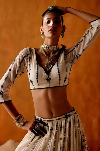 OFF WHITE SEQUINED EMBROIDERED WORK GEORGETTE LEHENGA  SET WITH CHOLI WITH DUPATTA.