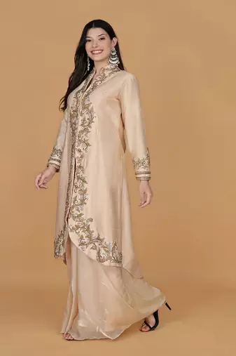Light peach raw silk stone and crystal work long jacket with shimmer organza drape skirt