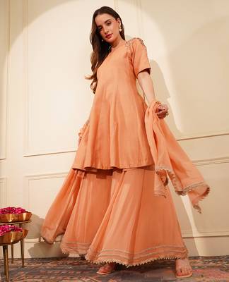 dark peach katan silk and georgette peplum sharara set 1