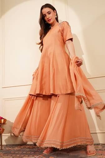 Dark peach katan silk and georgette peplum sharara set