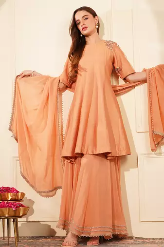 dark peach katan silk and georgette peplum sharara set