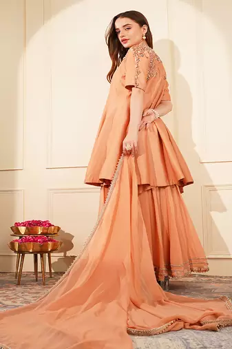 dark peach katan silk and georgette peplum sharara set