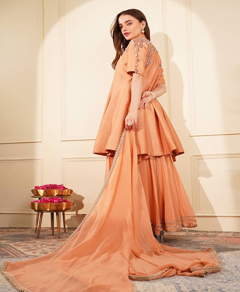 Dark peach katan silk and georgette peplum sharara set
