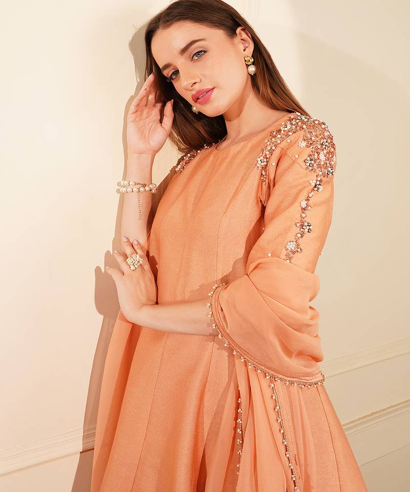 Dark peach katan silk and georgette peplum sharara set