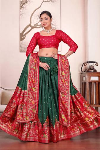 Green patola print dola silk semi stitched lehenga choli with tassels