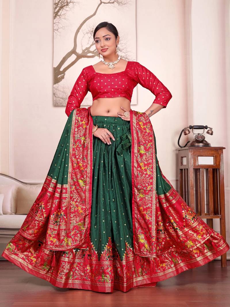 Green patola print dola silk semi stitched lehenga choli with tassels