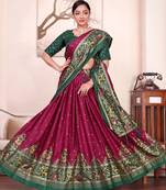 purple patola print dola silk lehenga set with choli and dupatta with tassels