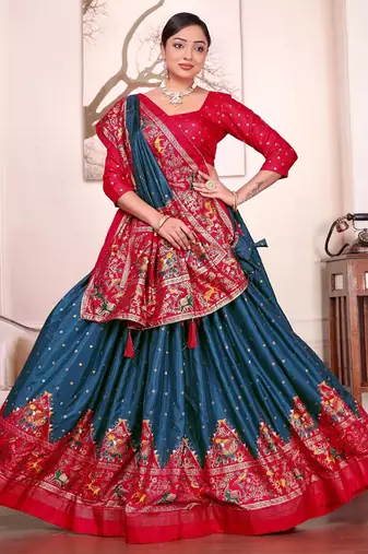 teal-blue patola print dola silk lehenga set with choli and dupatta with tassels