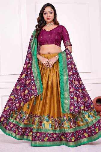 mustard patola print dola silk lehenga set with choli and dupatta with tassels