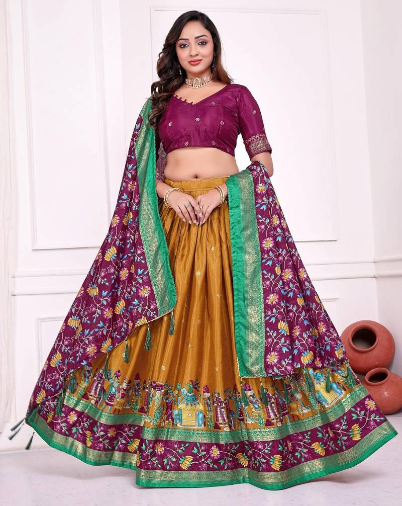 mustard patola print dola silk lehenga set with choli and dupatta with tassels