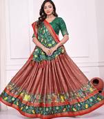 peach patola print dola silk lehenga set with choli and dupatta with tassels