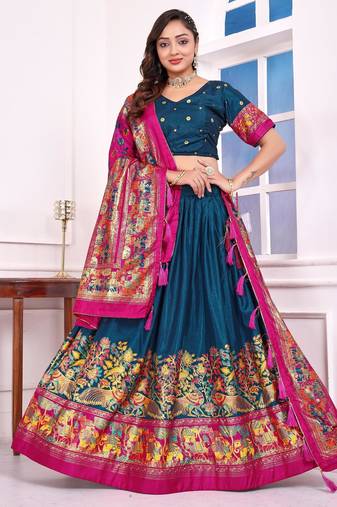teal-blue patola print dola silk lehenga set with choli and dupatta with tassels