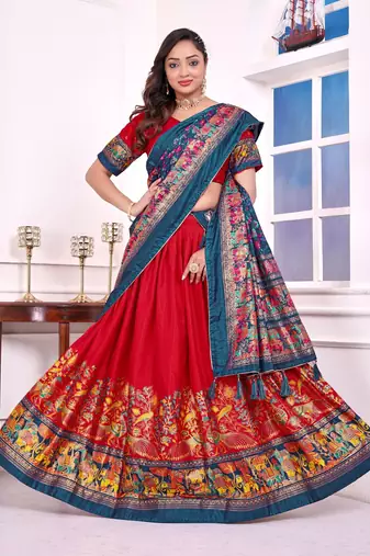 red patola print dola silk lehenga set with choli and dupatta with tassels