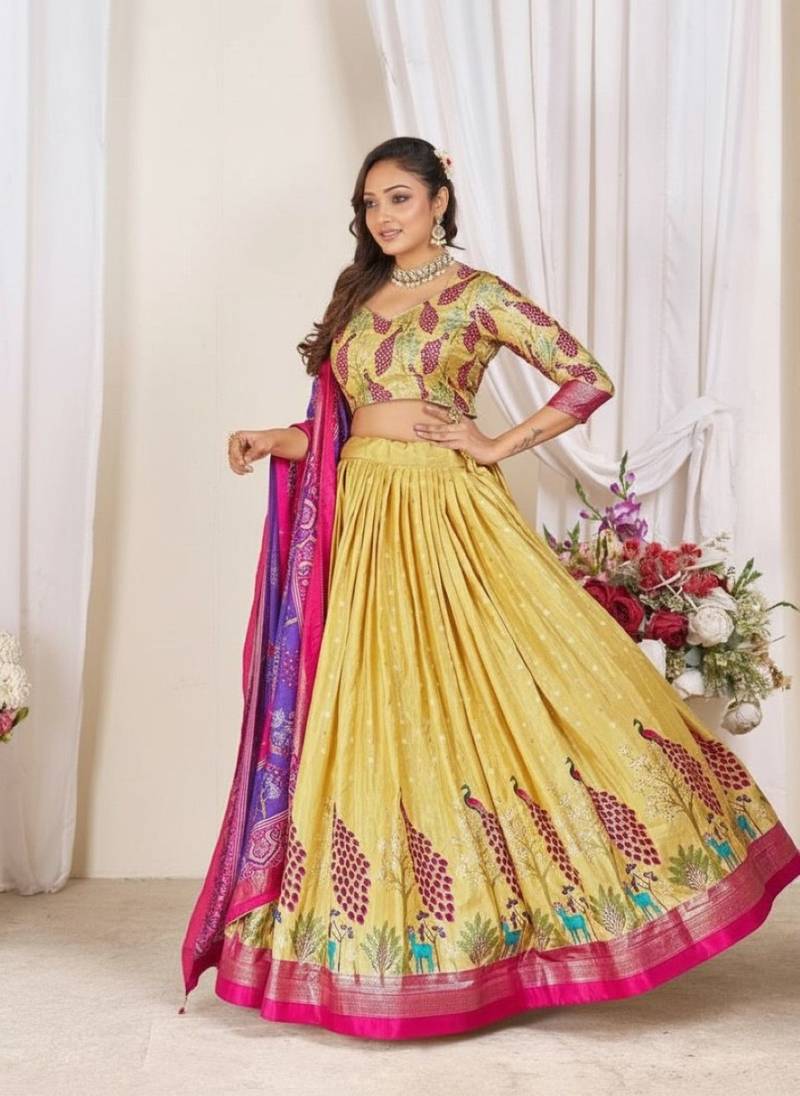 yellow patola print dola silk lehenga set with choli and dupatta with tassels