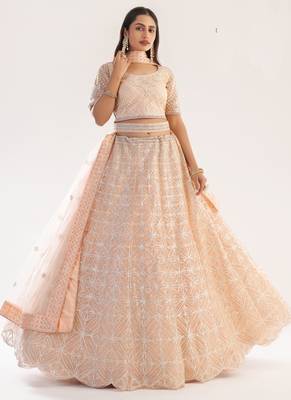 light peach net embroidered wedding wear lehenga with choli and dupatta 2