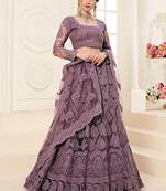 lavender heavy butterfly net embroidered wedding wear lehenga with choli and dupatta