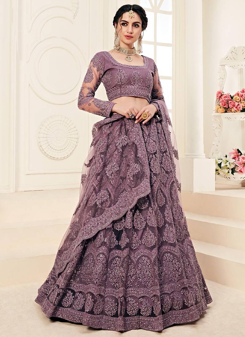 lavender heavy butterfly net embroidered wedding wear lehenga with choli and dupatta
