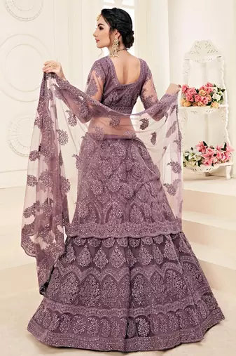 lavender heavy butterfly net embroidered wedding wear lehenga with choli and dupatta