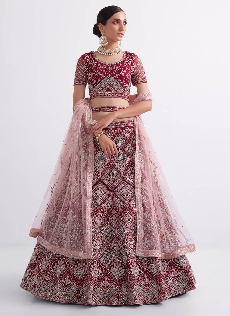maroon heavy butterfly net embroidered bridal lehenga with choli and dupatta