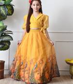 Girls yellow peacock print lehenga set with puff sleeve blouse