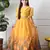 Girls yellow peacock print lehenga set with puff sleeve blouse