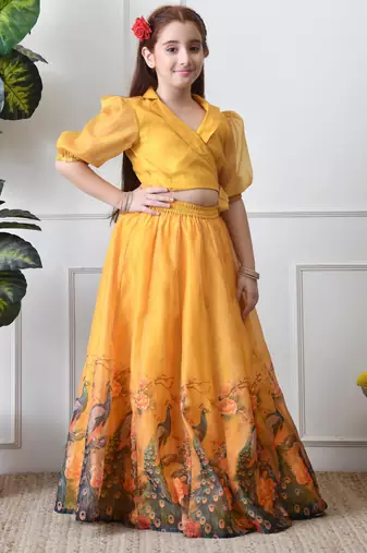 Girls yellow peacock print lehenga set with puff sleeve blouse