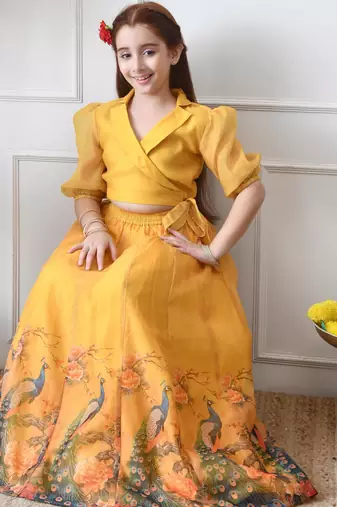Girls yellow peacock print lehenga set with puff sleeve blouse