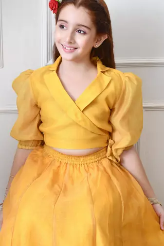 Girls yellow peacock print lehenga set with puff sleeve blouse