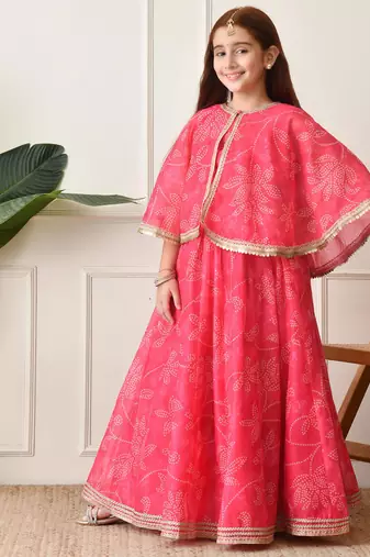 Girls    pink printed lehenga with matching cape and crop top set