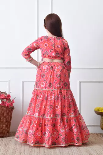 Girls peach printed lehenga choli set with embroidered yoke and dupatta