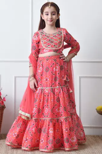 Girls peach printed lehenga choli set with embroidered yoke and dupatta