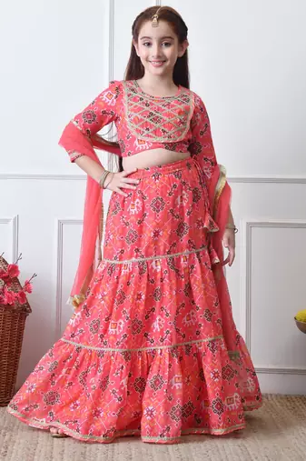 Girls peach printed lehenga choli set with embroidered yoke and dupatta
