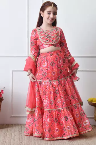 Girls peach printed lehenga choli set with embroidered yoke and dupatta
