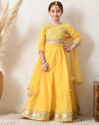 Girls yellow embroidered lehenga choli set with net dupatta 1