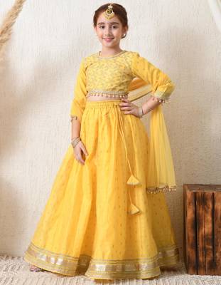 Girls yellow embroidered lehenga choli set with net dupatta 4
