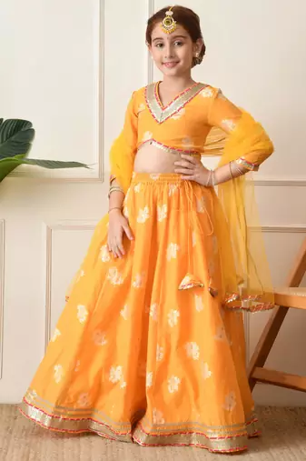 Girls mustard yellow embroidered lehenga choli set with net dupatta