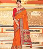 Orange colour plain border work silk saree with blouse